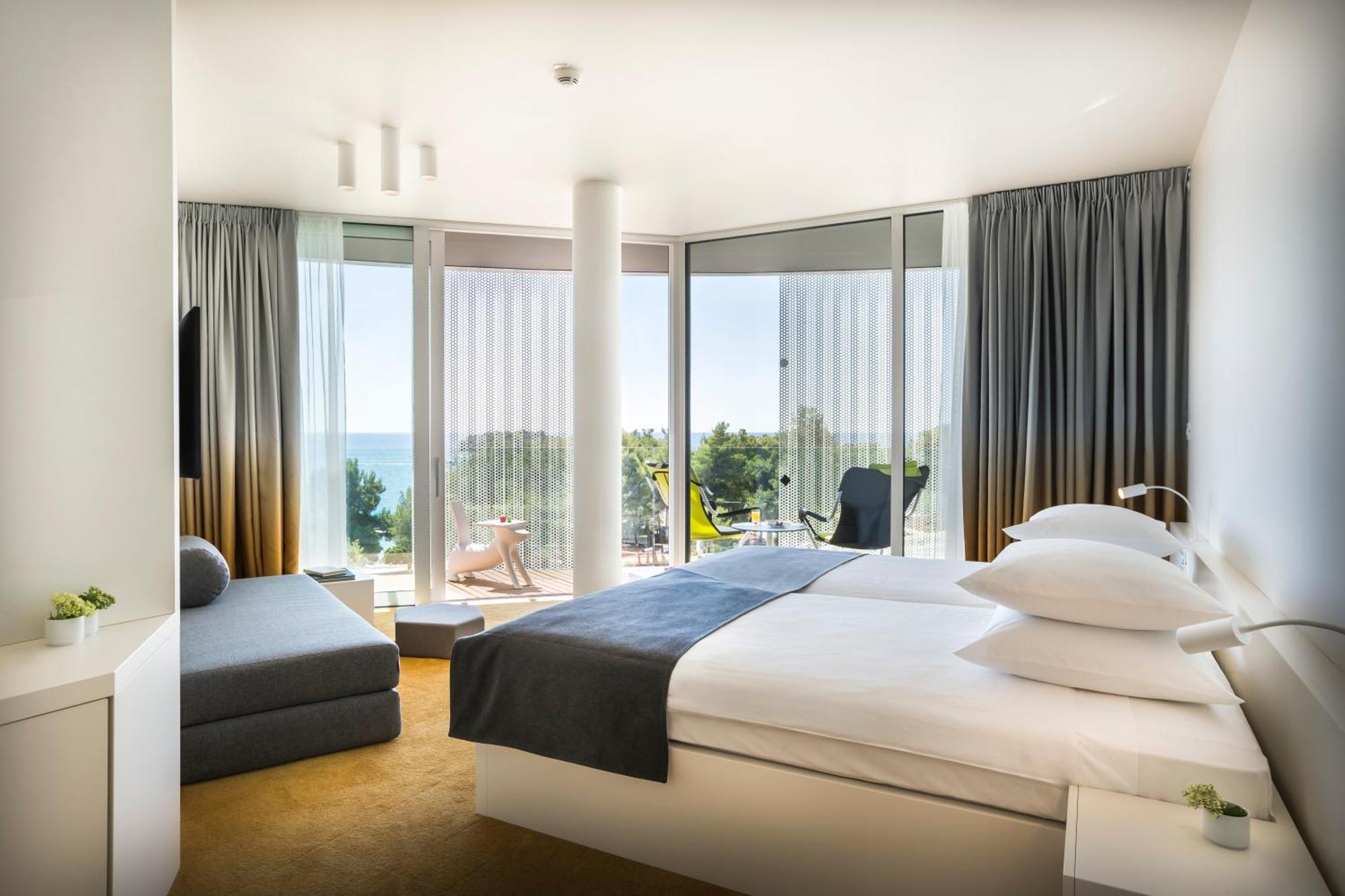 Camera Grand Matrimoniale/Doppia con Letti Singoli con Divano-Letto