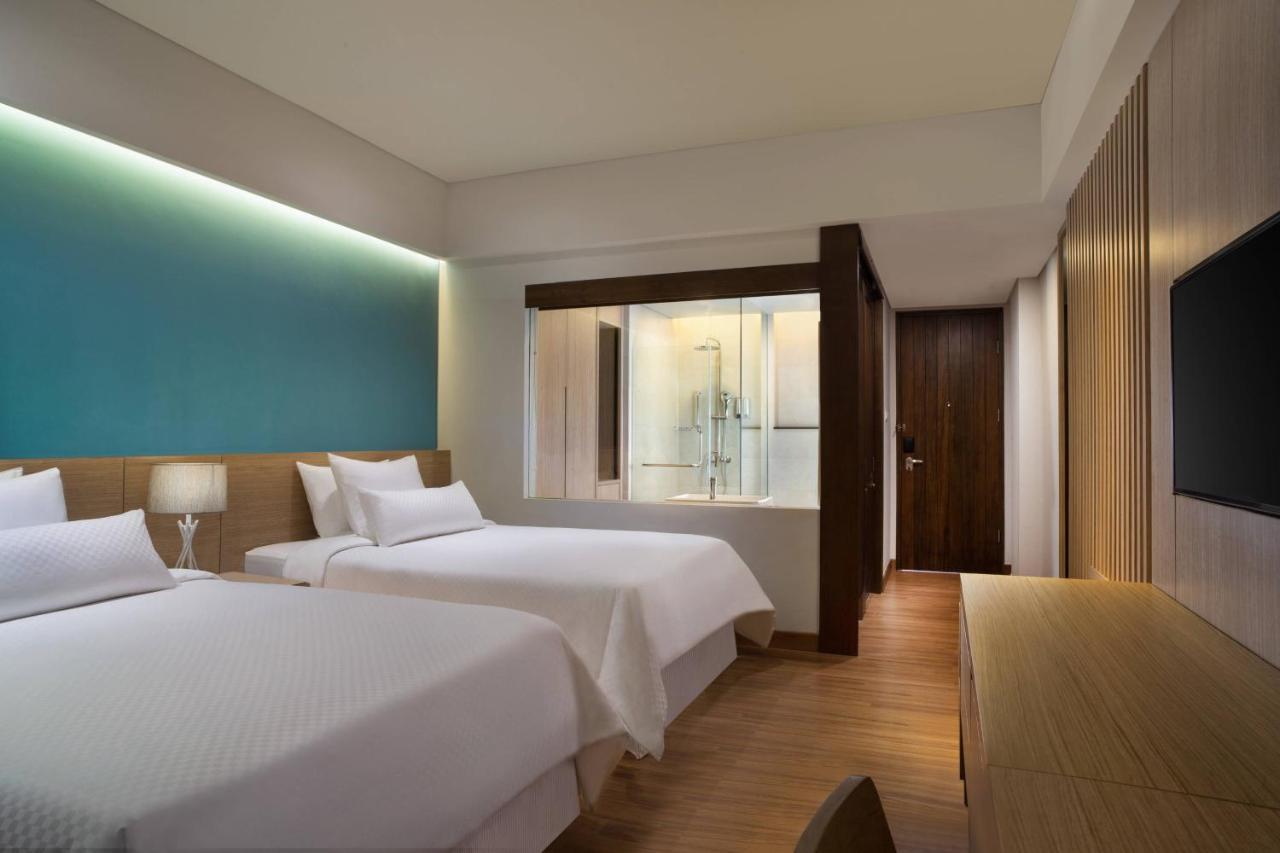 Deluxe Room Guest room 2 Twin or Single Beds Garden view Balcony Daily Shuttle to Monkey Forest Daily Yoga Bike to borrow Family Activity 24 Hour access to Motion Fitness Center