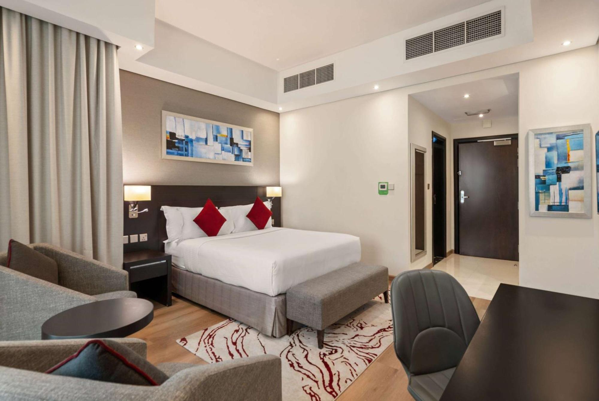 Chambre Lit King-Size Deluxe - Non-Fumeurs
