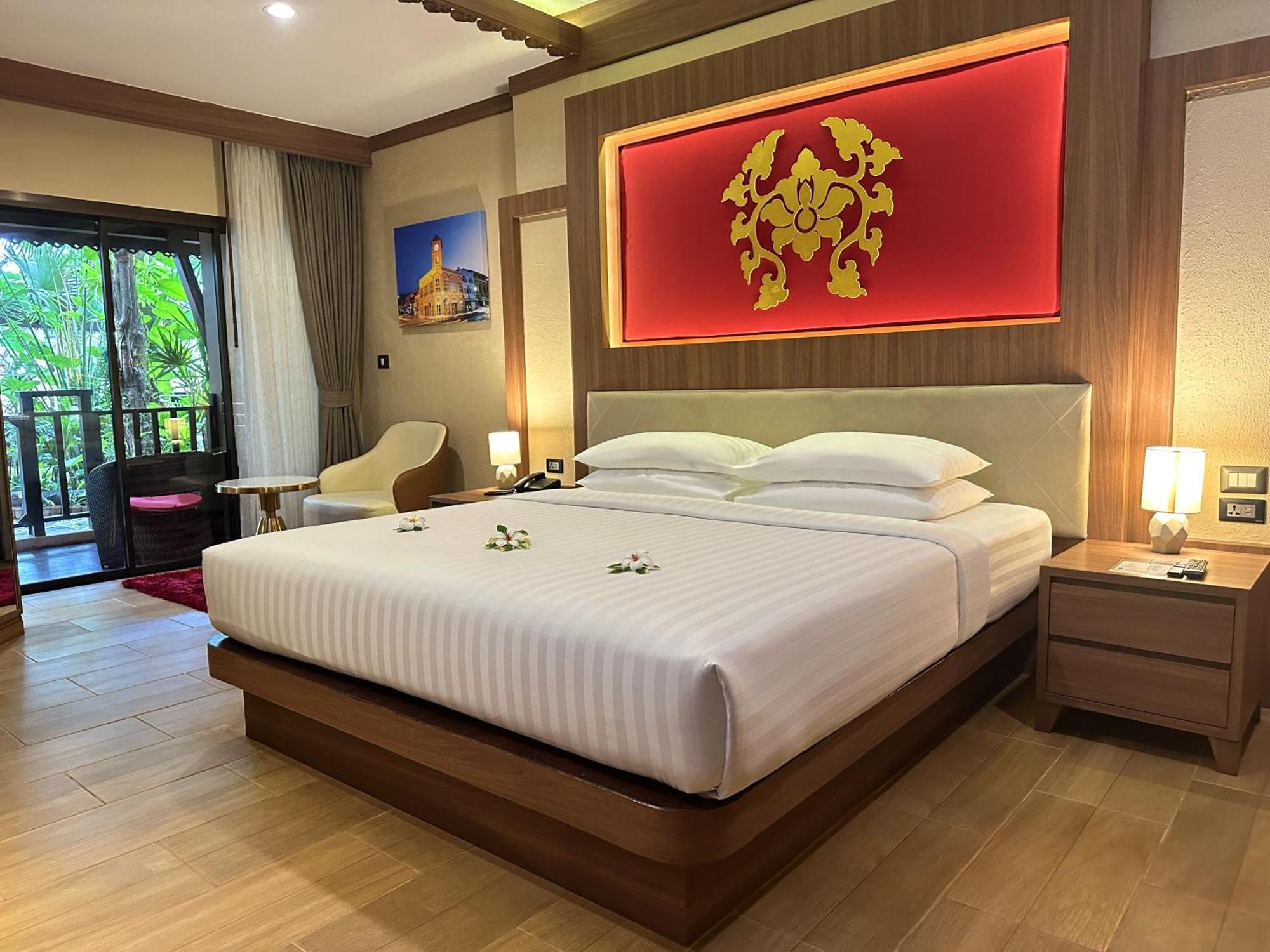 Zimmer mit Queensize-Bett und Gartenblick