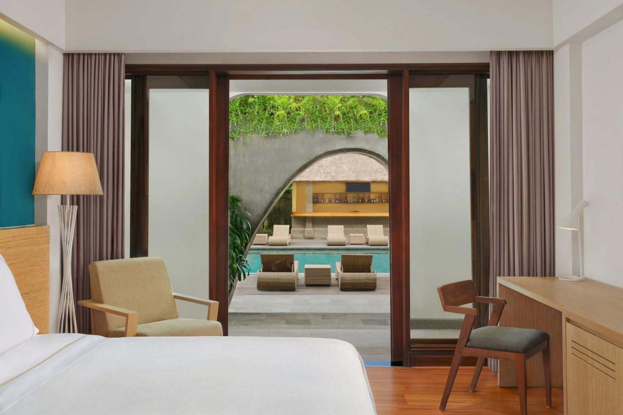 Deluxe King Room Pool Access Garden Level Mini Bar Daily Shuttle to Monkey Forest Daily Yoga Bike to borrow Family Activity 24 Hour access to Motion Fitness Center