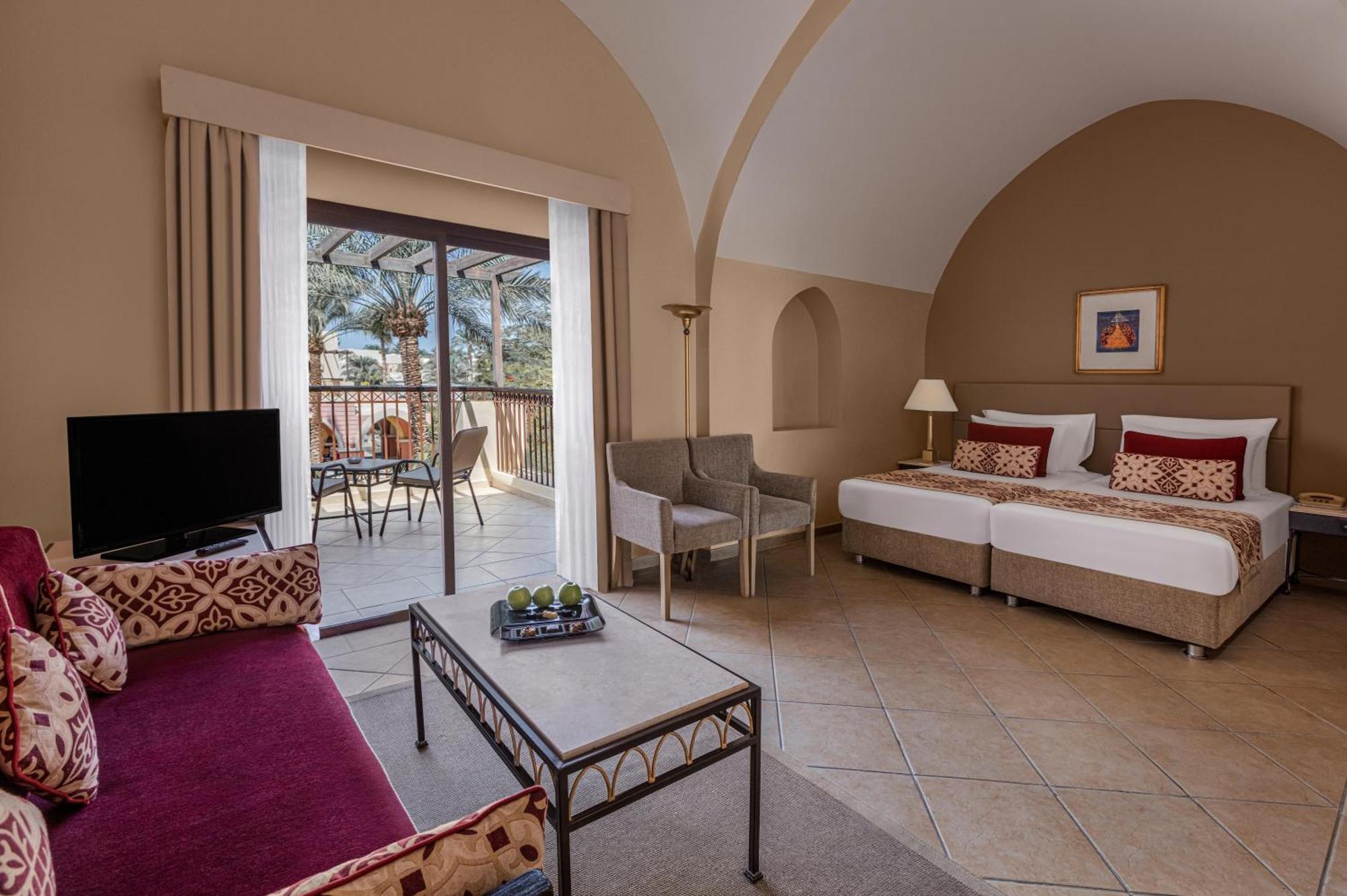Deluxe Familienzimmer mit 2 Einzelbetten und Gartenblick