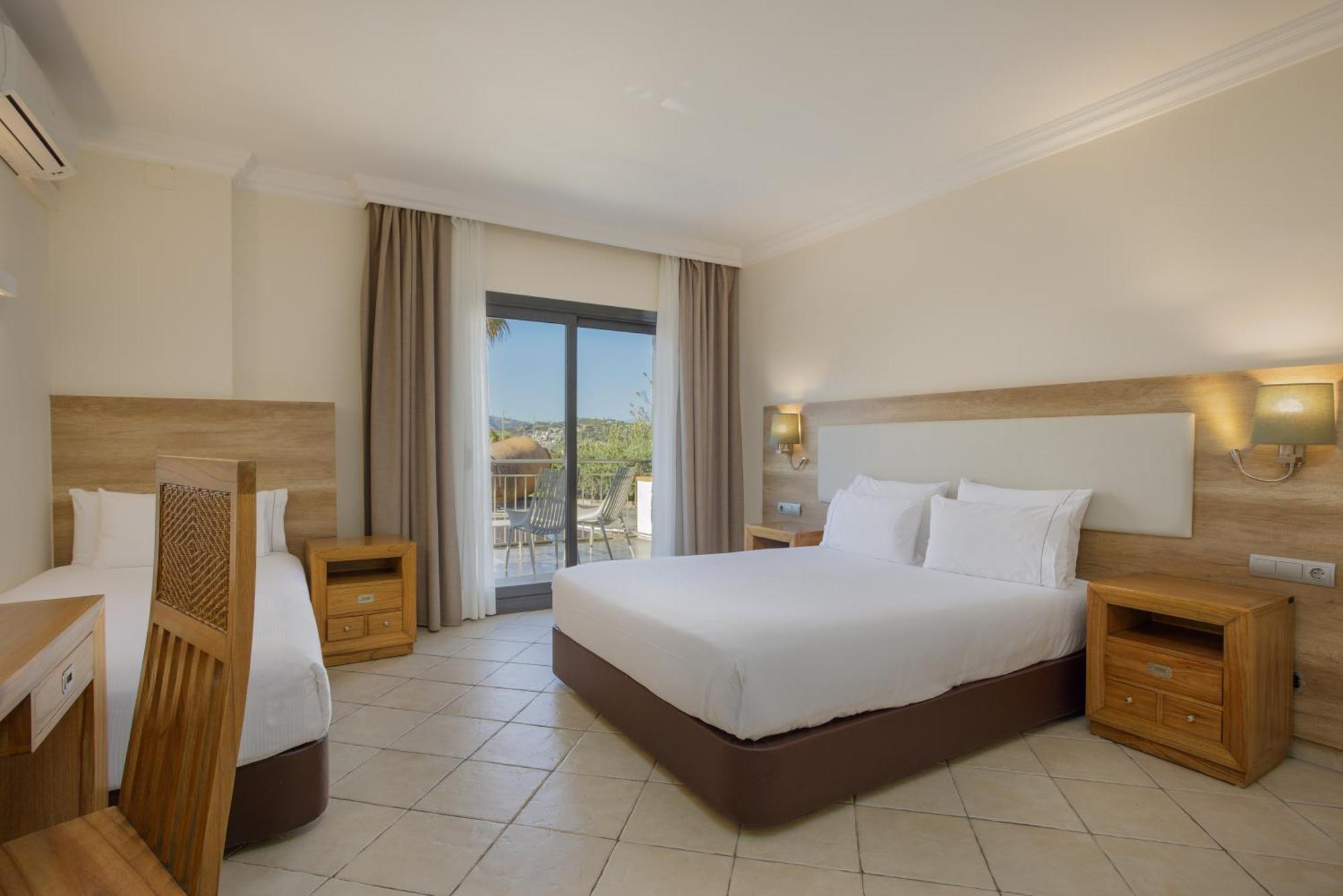 Habitación Doble Estándar con cama supletoria - 1 o 2 camas