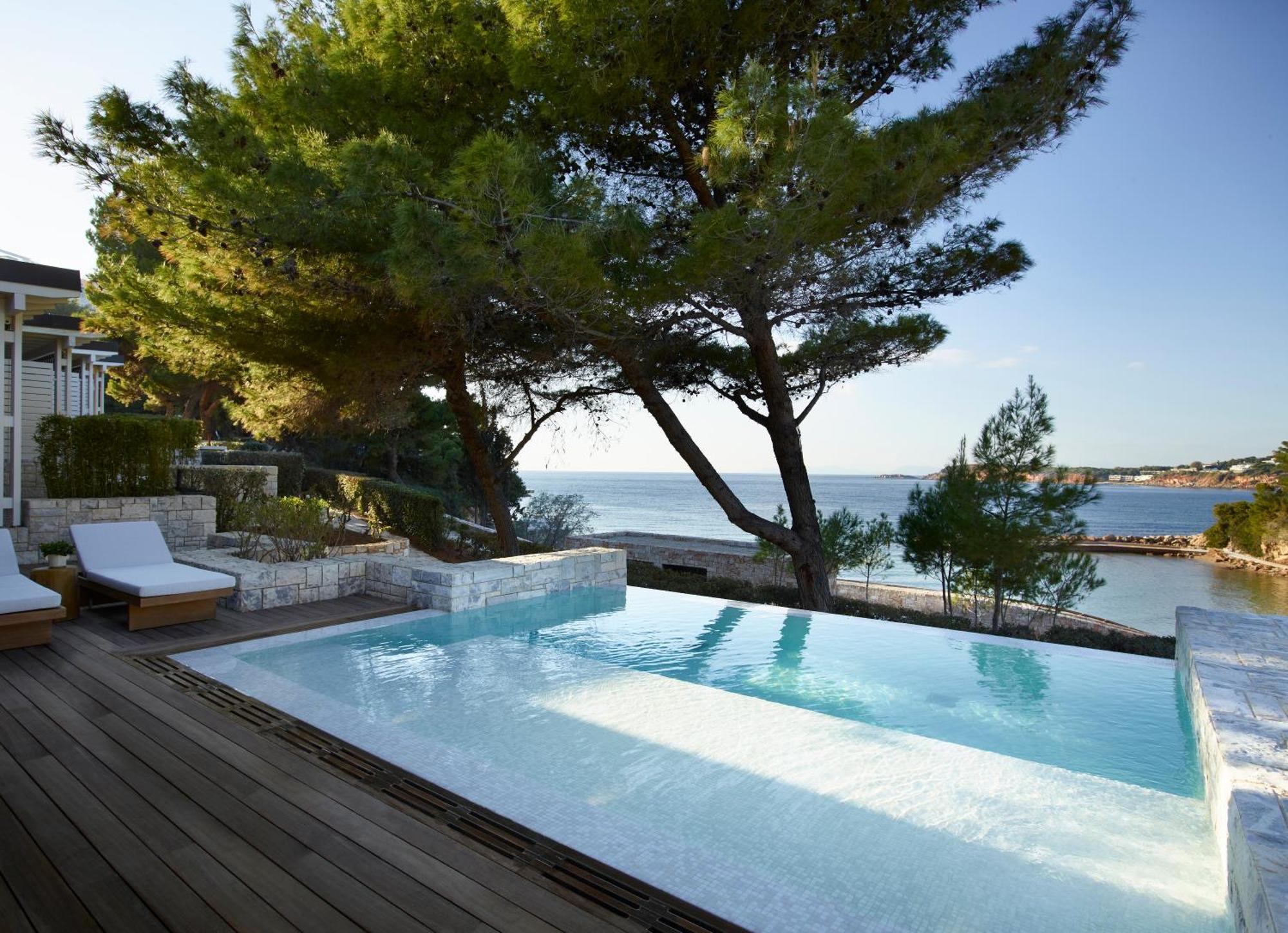 Bungalow con piscina y vistas al mar