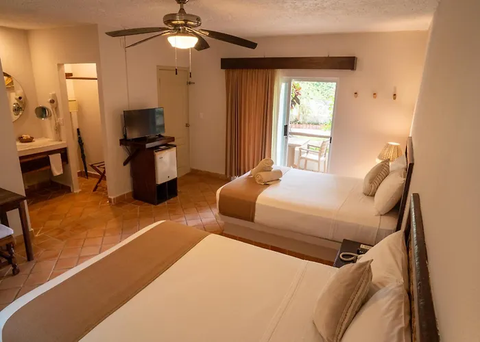 Petit Lafitte Beach Front Hotel & Bungalows